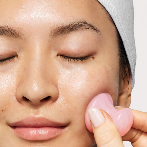 Model getting massage on face